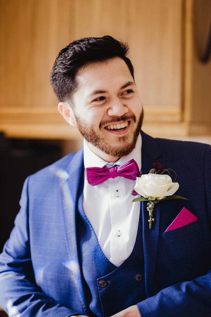 Portrait of the groom, blue wedding suit