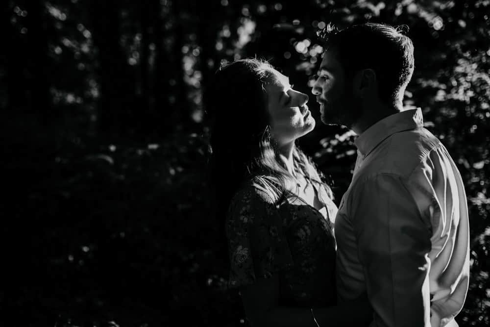 black and white photo of a romantic couple