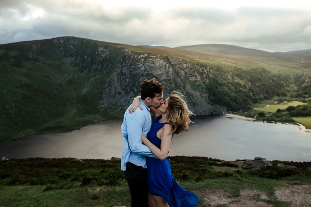 couple kissing at sunset by Lough Tay engagement session wicklow