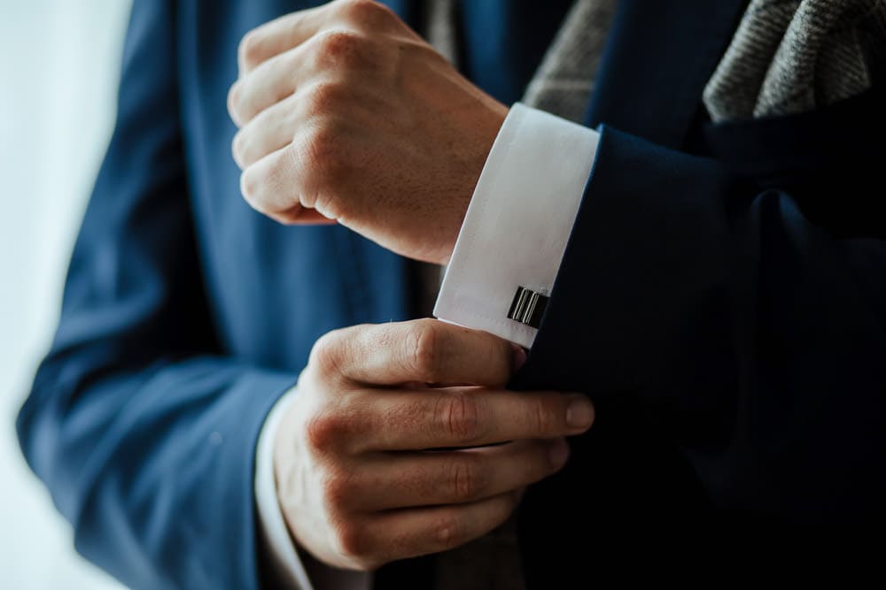 groom and cufflinks