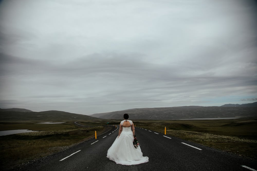 bride in a white dress wedding in iceland beautiful landscape
