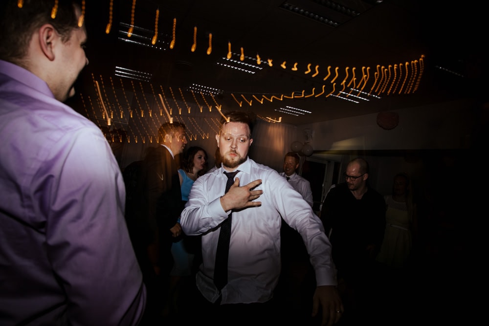 groom dance off at the wedding