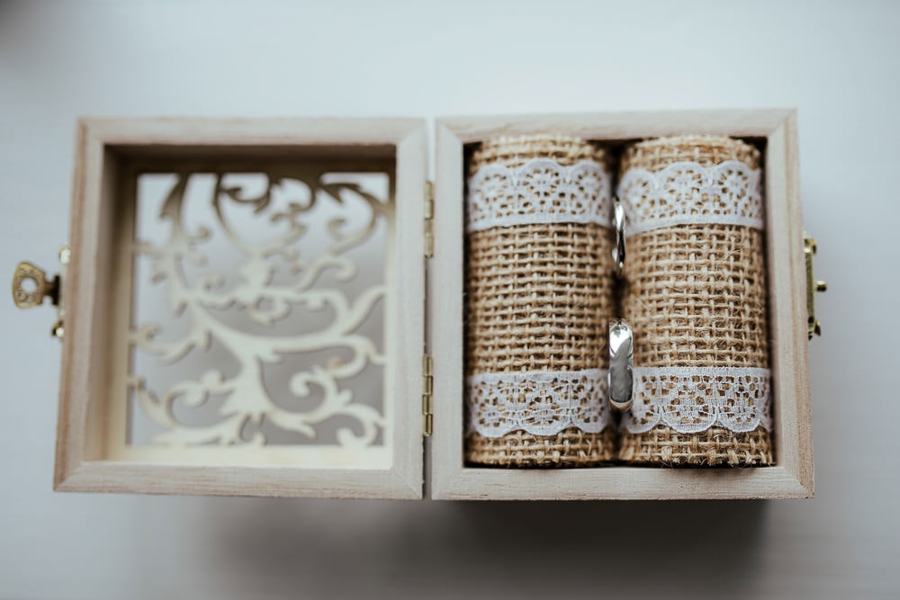 wedding rings in a rustic wooden box