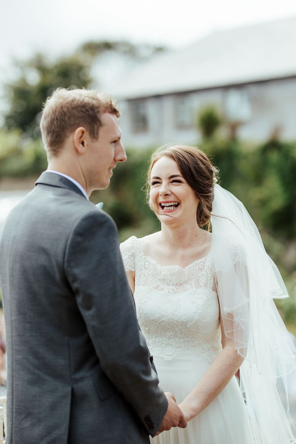 happy bride at her outdoor wedding ceremony documentary wedding photographer