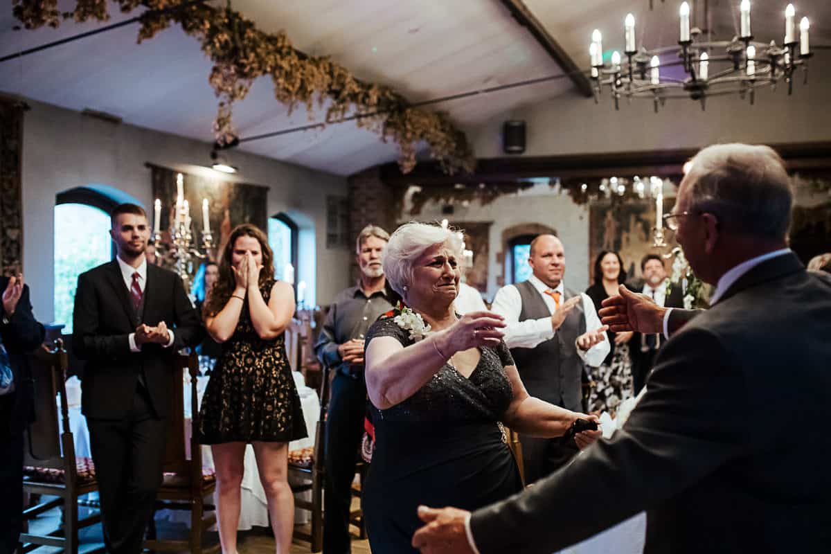 husband and wife hugging wedding anniversary celebration