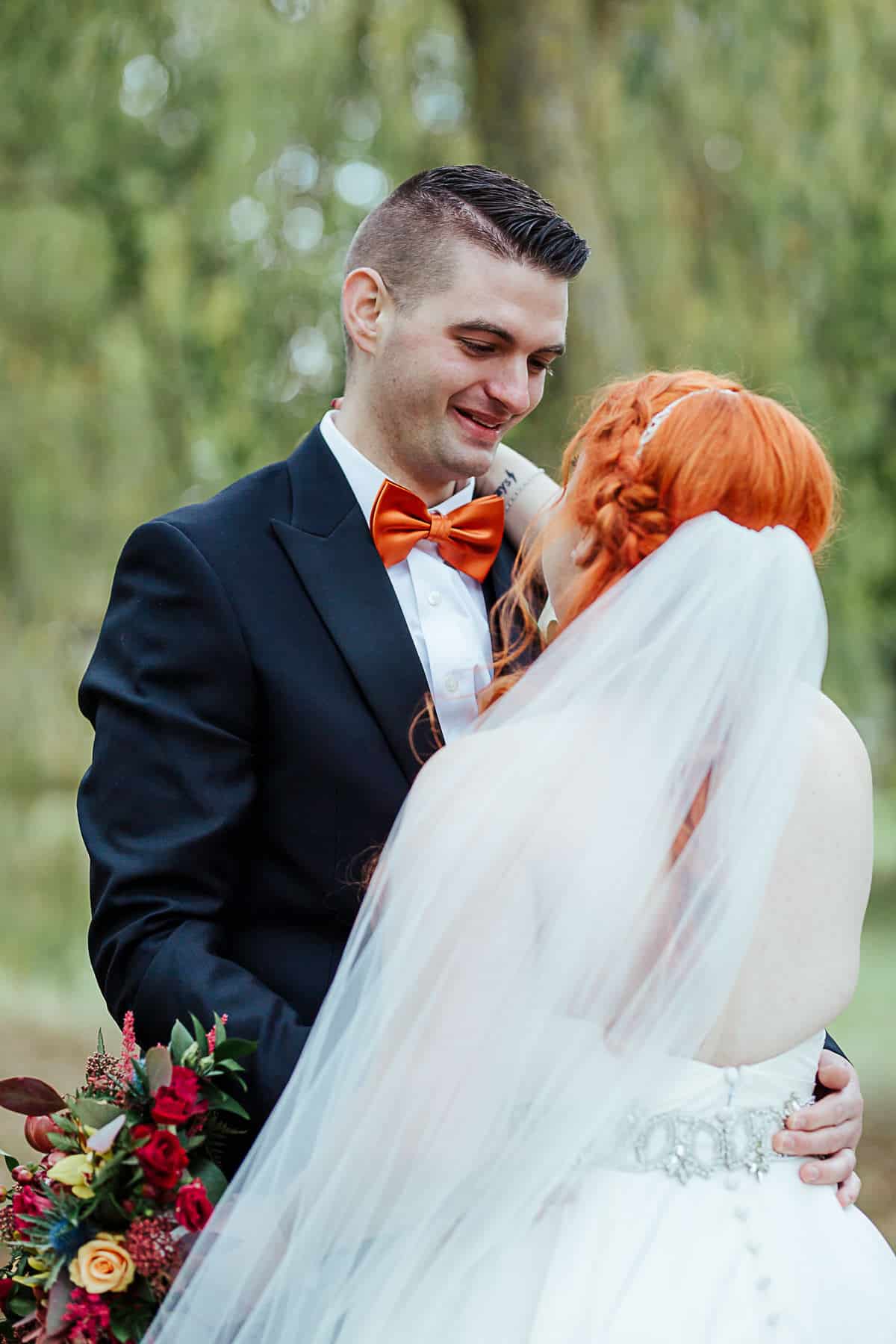 emotional groom crying during first look
