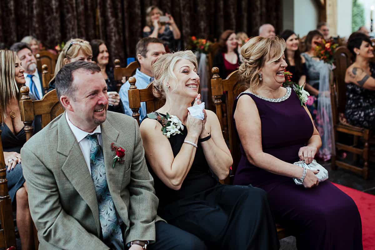 mother of the bride crying during wedding ceremony