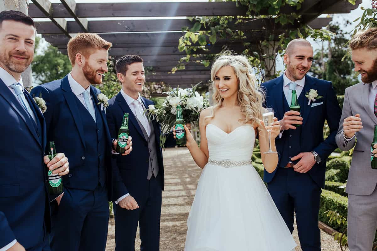 groomsmen with personalized beer bottles gromsmen gift ideas