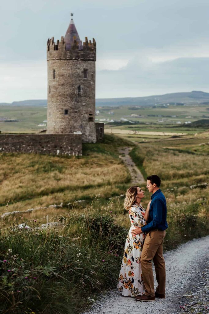 couple photo at doonagore castle cliffs of moher