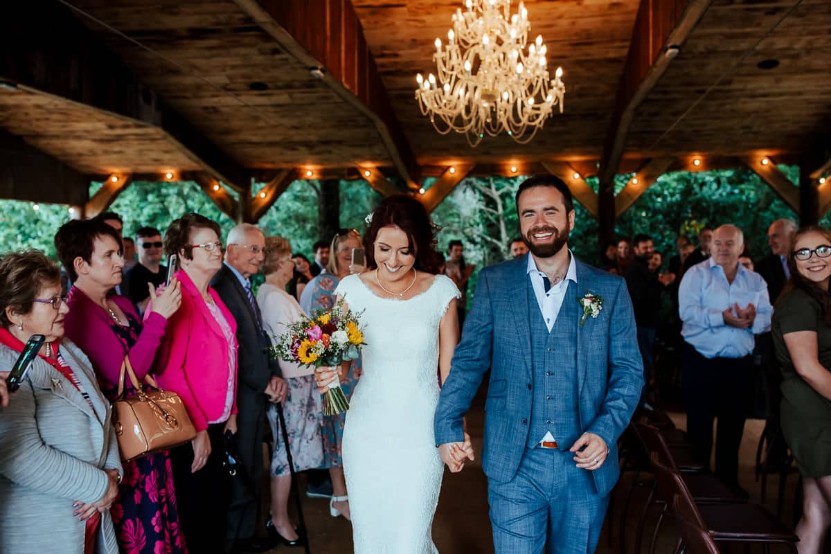 outdoor wedding ceremony in the woodlands at martinstown house