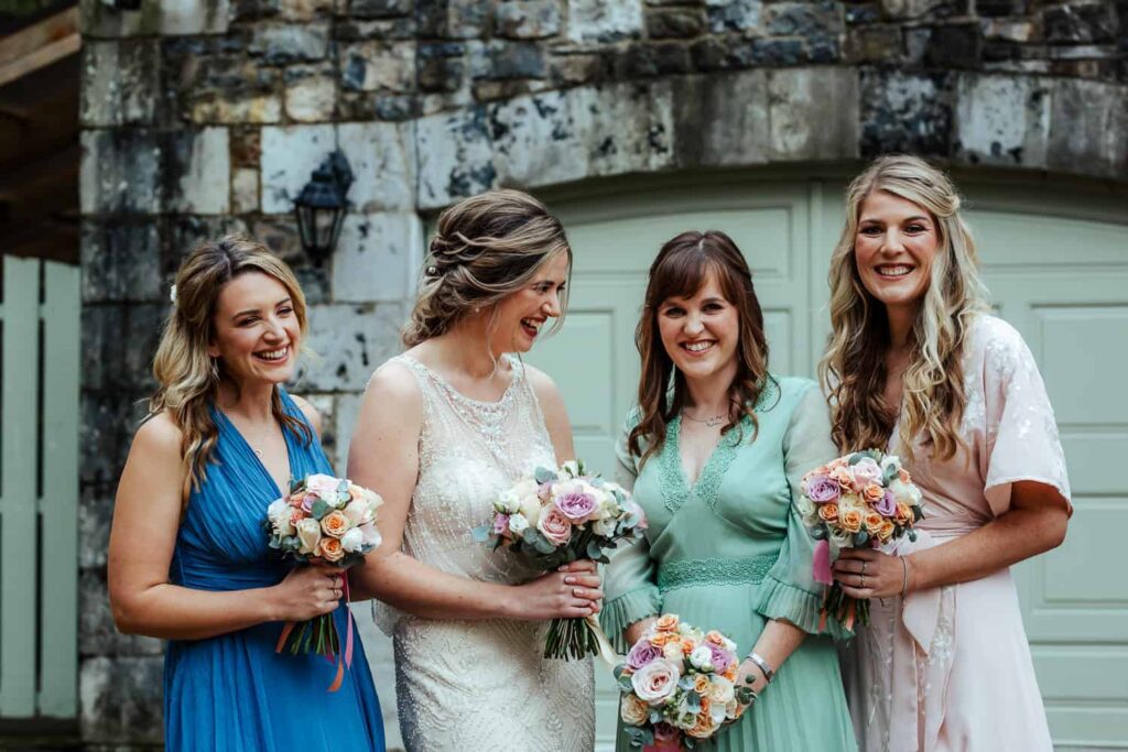 mismatched pastel bridesmaid's dresses