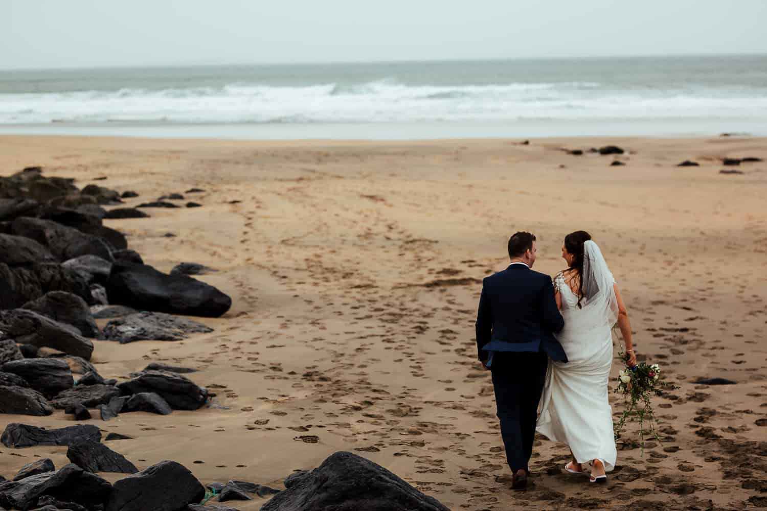 bride and groom at fanore beach clare
