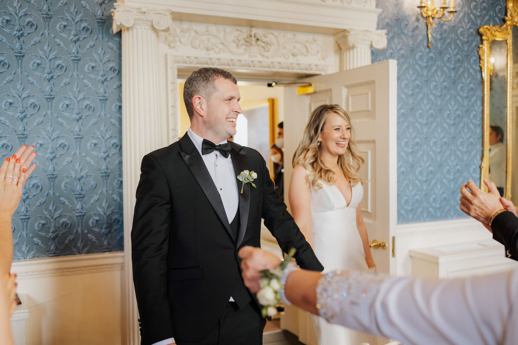 wedding couple entering the dining room at the merrion hotel